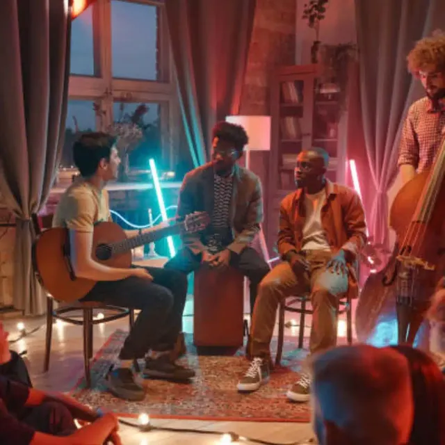 Musicians playing acoustic guitar, cajón and double bass in a lounge